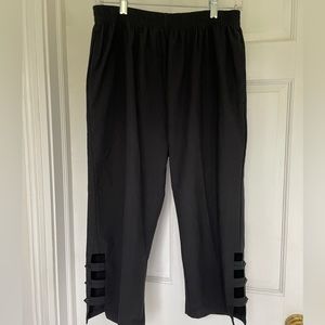 Large black capris with decorative hem